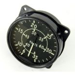 A vintage aeroplane knots dial, in shaped casing, with Arabic numerals, 9cm diameter, marked