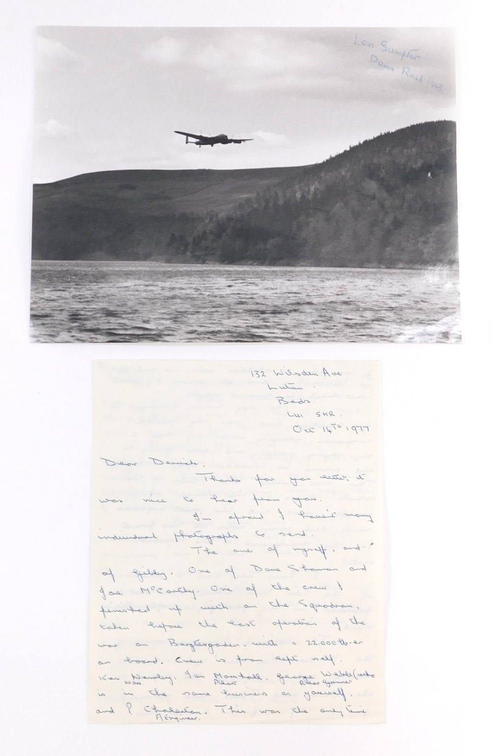 A photograph of the Lancaster flying over the Derwent Dam, signed by Dambuster Len Sumpter, together