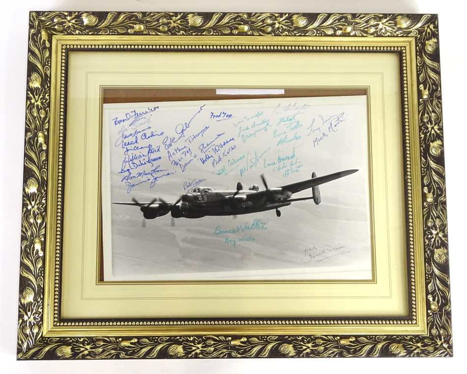 A Derrick Warren photograph of The City of Lincoln Lancaster Bomber, with many signatures