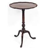 A 19thC mahogany Chippendale style pie crust snap top table, the moulded top raised on a slender