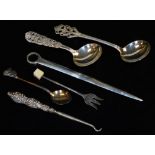 A small Victorian silver skewer, 15cm L, London 1863, 0.50oz, two continental preserve spoons,