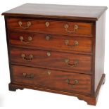 An early 19thC mahogany chest, of good proportion with four long drawers, each with elaborate swan