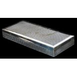 An Elizabeth II silver table cigarette box, of low rectangular design, with hinged lid and having