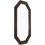 A 20thC oak framed mirror, of octagonal form with a bead outline and bevel glass, 48cm H, 82cm W,