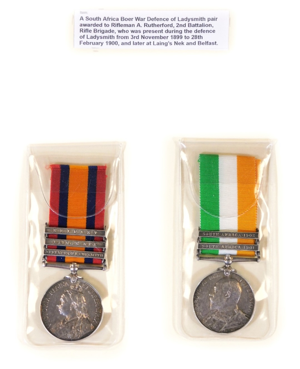 A South African Boer War medal pair, similarly marked A Rutherford, one with Belfast Laing's Nek and