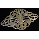 A Victorian silver double nurse's buckle, of shaped mitre outline, partially pierced and etched with