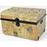 A 20thC tin trunk, over stained with papier mache music score decoration, with carrying handles
