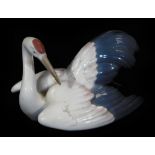 A Lladro figure of a Stork, no. 1599, printed and impressed marks beneath, 11cm W.