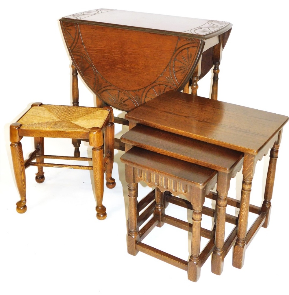 Various furniture, a 20thC stained elm stool, of rectangular form with rush seat, on turned legs