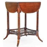 An Edwardian mahogany occasional table, with four drop leaves raised on bamboo style supports joined