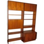 Two vintage G-Plan teak cabinets, each with upper double door cupboards above open shelves, one with