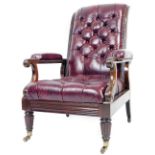 A 19thC mahogany framed library armchair, the button back seat and arms upholstered in red leather
