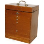 An early 20thC specimen cabinet, with chrome plated handle and seven front drawers, a hinged lid,