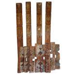 A set of four antique Moroccan architectural pilaster columns, and a set of eight associated