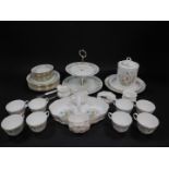 A group of Aynsley porcelain decorated in the Wild Tudor pattern, including a part tea set,