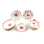 A group of Herend porcelain decorated in the Orange Red Apponyi pattern, comprising six tea plates