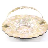 A Victorian papier mache and mother of pearl basket, with gothic brass swing handle, foliate