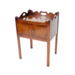 A Georgian style mahogany tray top commode, with two doors, raised on channelled square legs, 73cm