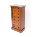 A Victorian mahogany Wellington chest, with seven graduated drawers, raised on a plinth base,