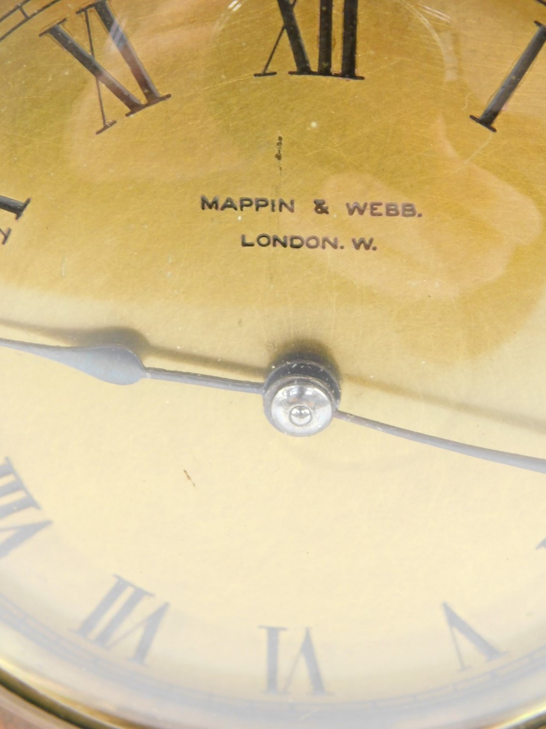 A early 20thC Mappin & Webb oak cased mantel clock, circular brass dial bearing Roman numerals, - Image 2 of 4