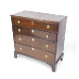 A George III mahogany chest of drawers, with four long graduated drawers, raised on bracket feet,