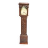 A Georgian oak long case clock, by I Hocking of Redruth, the break front arch dial decorated with