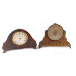 A 19thC mantel shelf barometer, circular silvered dial, in a brass casing, within an oak outer