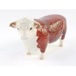A Beswick figure of a Hereford Bull, Champion of Champions, printed marks.