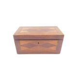 A 19thC parquetry tea caddy, of rectangular section, the hinged lid opening to reveal twin