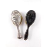 A George V silver and tortoiseshell hair brush, with pique decoration, Birmingham 1910, and a