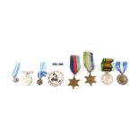 Four WWII medals, comprising Atlantic Star, 1939-1945 Star, Defence and War Medals, together with