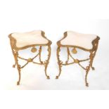 A pair of late 20thC rococo style brass and white onyx topped occasional tables, of convex square