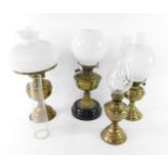 A Duplex brass oil lamp, with glass chimney and fluted white glass shade, 52cm H, brass oil lamp