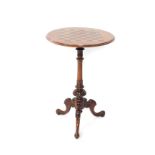 A Victorian walnut and chess board inlaid occasional table, the circular top raised on a turned