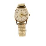 A 1950's Rolex 9ct gold cased wristwatch, circular silver dial bearing Arabic numerals at evens,