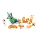 A group of Sylvac pottery figures of terriers, and other dogs, including a planter, dog with it's