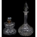 A late 19thC cut glass decanter and stopper, of compressed hour glass form, with silver collar,