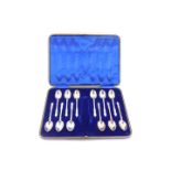 A set of twelve George V silver apostle tea spoons, cased, Sheffield 1910, 4.54oz.