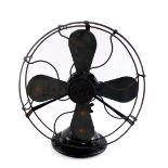 A GEC adjustable metal fan, raised on a cast iron base, 30cm H.