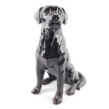 A Beswick Pottery Fireside figure of a black labrador, modelled in seated pose, no.2314, printed and