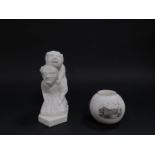 A late 19thC WH Goss parian figure group, modelled as the devil looking over Lincoln, 15cm H,