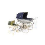 A Wilson Silver Cross pram, coach built frame, with blue and grey body and blue folding hood,