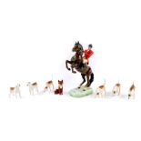 A Beswick figure of a huntsman, modelled on a prancing horse, No 868, printed and impressed marks,