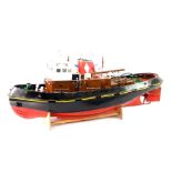 A Mountfleet Models kit built Logarth Motor Tug remote control boat, hull painted red and black,