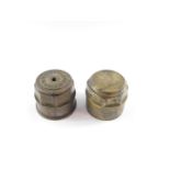 Two brass carriage wheel hub nuts, stamped Foreman & Son Makers Spalding, and W. Rainforth & Sons