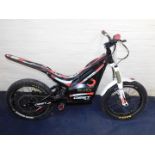 An Oset 20.0 Electric Trials Bike, 1200watt, max speed 15/20 mph, range 10 miles.