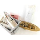 Model boat shells, bodies, parts, plans, etc. (1 box and loose)