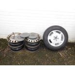 Five half JX15H2ET60 Mercedes-Benz wheels, with plastic Mercedes-Benz hub caps, together with an