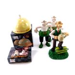 Wallace & Gromit collectibles, comprising Wallace garden ornament, two Wallace Bath & Shower Gel