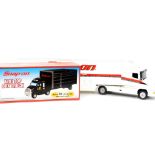 A Snap-On die cast top box truck 1202, 1:18 scale, boxed, together with a Snap-On model truck. (2)